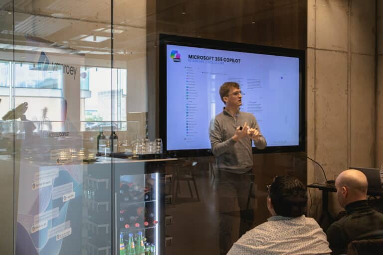 Dries De Bie over Microsoft 365 Copilot tijdens een AI Inspiration Day van VanRoey ICT Group
