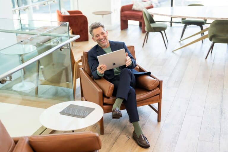 Man with Surface Pro, government employee